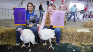 The 2 winners of YMTS with their turkeys