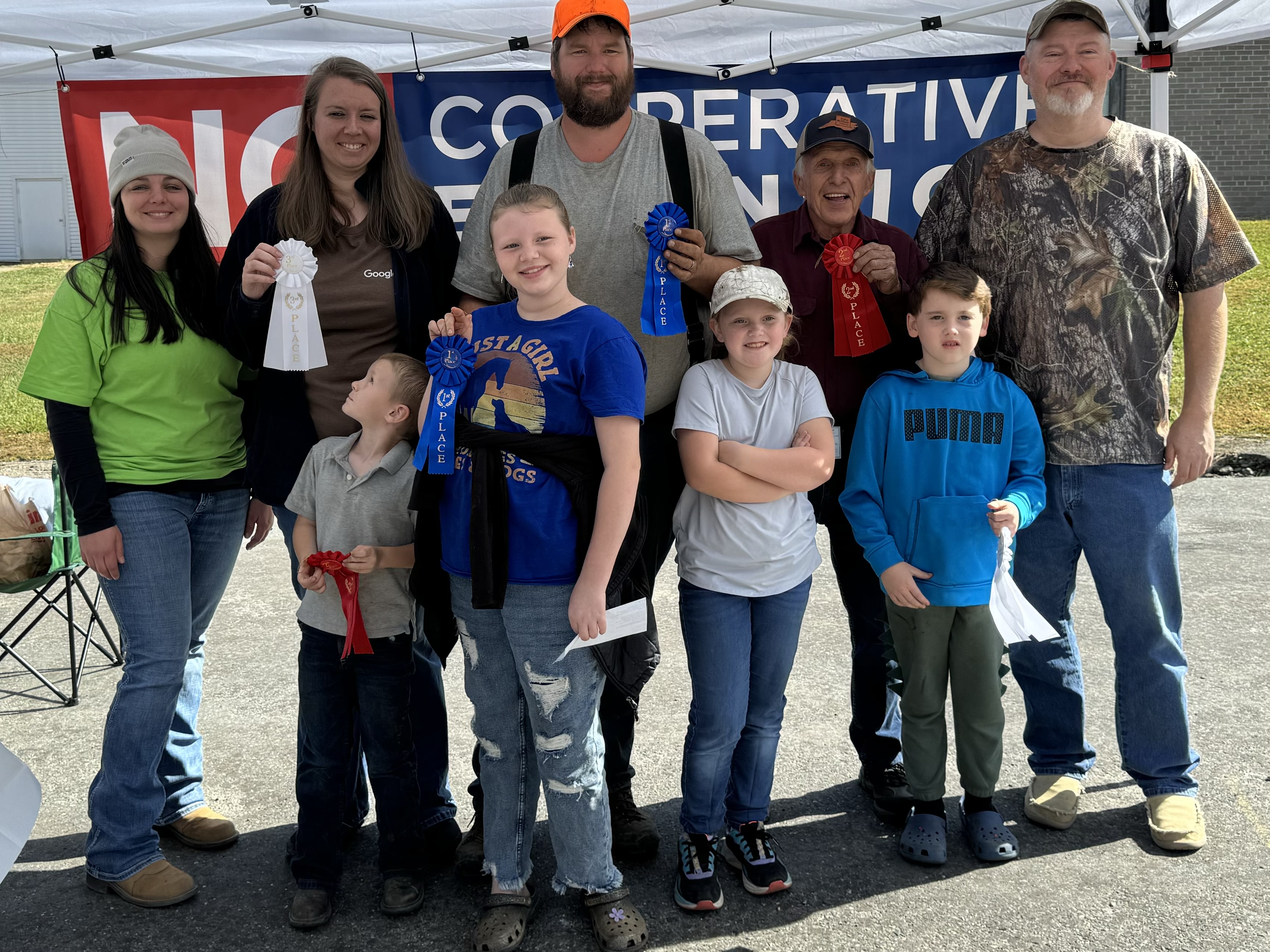 Youth and Adult pumpkin contest winners with Extension Staff